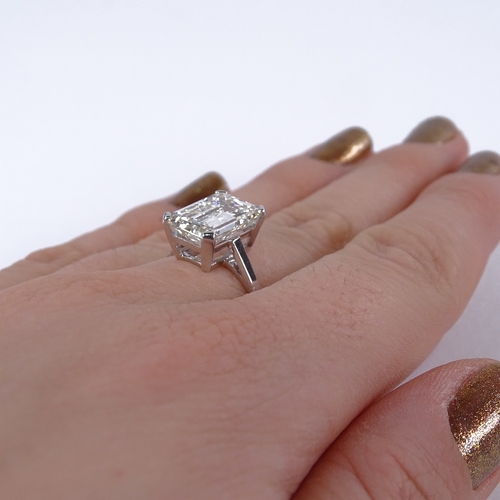 1103 - A 4.67ct emerald-cut solitaire diamond ring, with BGI Diamond Grading Report No. 611 K9 G15 11933 st... 