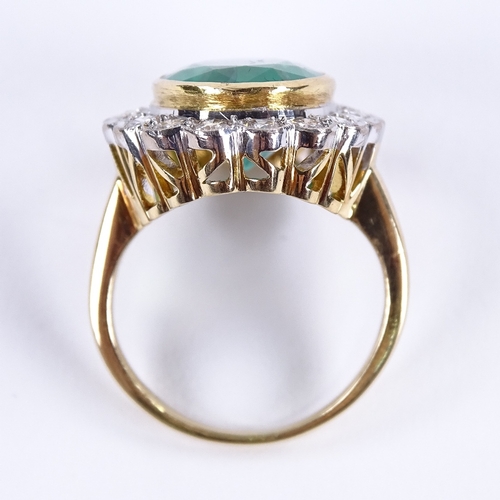 1108 - A large oval emerald and diamond cluster ring, central oval mixed-cut emerald approx 6.75ct, surroun... 