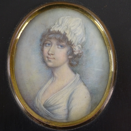 2197 - A 19th century miniature watercolour on ivory, portrait of a woman in ebonised frame, overall frame ... 