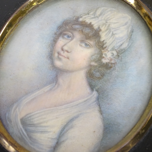 2197 - A 19th century miniature watercolour on ivory, portrait of a woman in ebonised frame, overall frame ... 