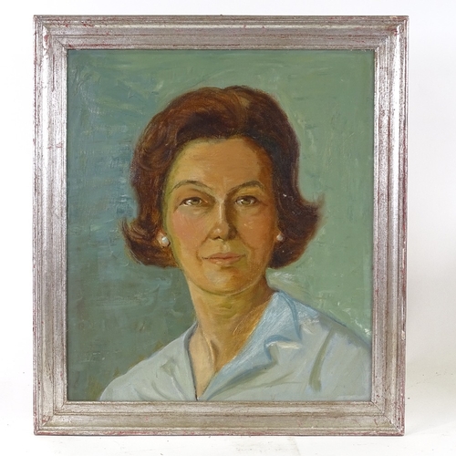 2224 - Mid-20th century oil on canvas, portrait of a woman, unsigned, 16