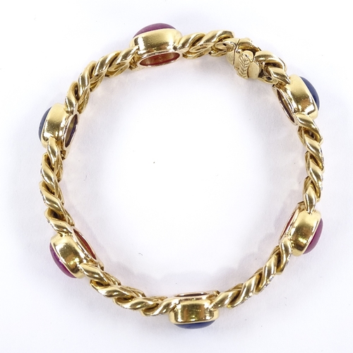 1114 - A sapphire ruby and diamond Cuban link bracelet, set at alternates with cabochon-cut sapphires and r... 