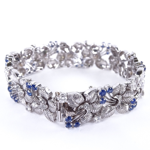 1118 - A sapphire and diamond floral bracelet, floral spray panels set with round-cut sapphires and diamond... 