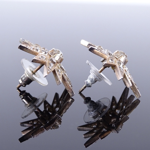 1121 - A pair of Victorian diamond starburst stud earrings, set with old and rose-cut diamonds, total diamo... 