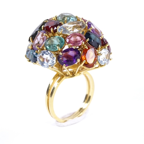 1122 - A large gem-set bombe ring, circa 1980s, gemstones include amethyst, garnet, citrine, aquamarine etc... 