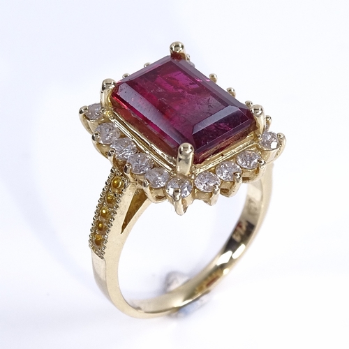 1131 - A pink tourmaline diamond and yellow sapphire cluster ring, set with 5.5ct emerald-cut pink tourmali... 