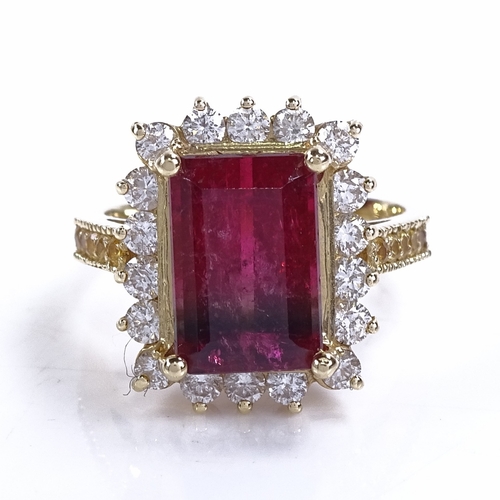 1131 - A pink tourmaline diamond and yellow sapphire cluster ring, set with 5.5ct emerald-cut pink tourmali... 