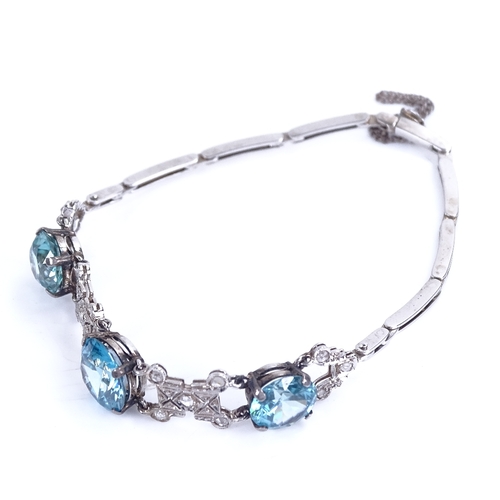 1136 - An 18ct white gold blue zircon and rose-cut diamond bracelet, Art Deco geometric form, set with grad... 