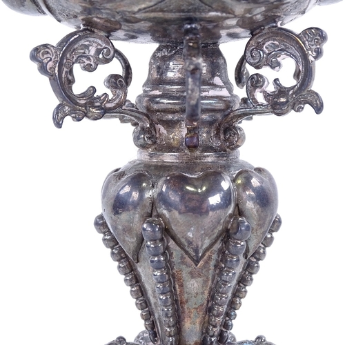 1138 - A large late 19th century German silver cup, Hanau, body and foot decorated with 6 lobes with inters... 