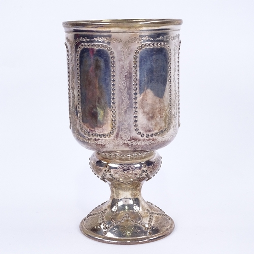 1140 - A Victorian silver footed goblet, cylindrical form with beaded panels and bright-cut engraved foliat... 