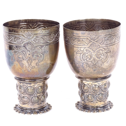 1143 - A pair of 19th century German silver double marriage wedding cups, Hanau, cylindrical form with cyli... 