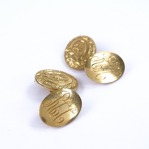 1153 - A pair of late 19th/early 20th century 18ct gold oval panel cufflinks, Order of the Garter decoratio... 