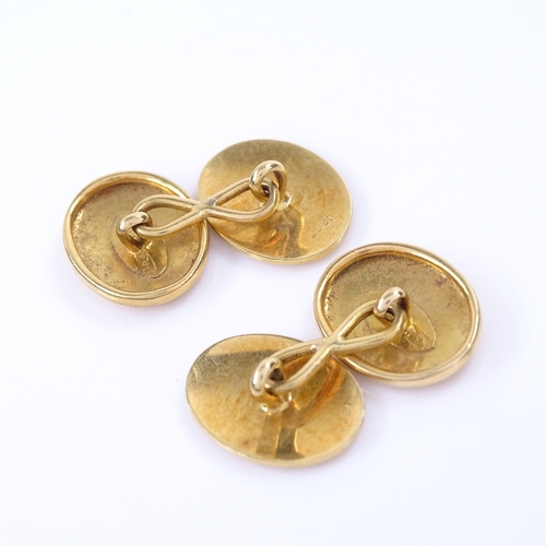 1153 - A pair of late 19th/early 20th century 18ct gold oval panel cufflinks, Order of the Garter decoratio... 