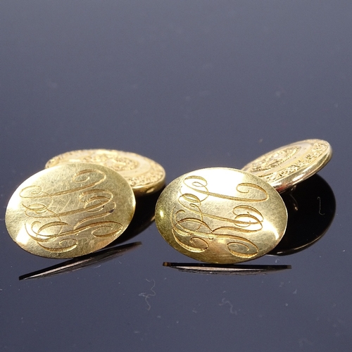 1153 - A pair of late 19th/early 20th century 18ct gold oval panel cufflinks, Order of the Garter decoratio... 