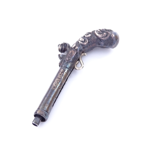 1154 - An early Victorian novelty silver propelling pencil in the form of a flintlock pistol, barrel inscri... 