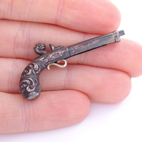 1154 - An early Victorian novelty silver propelling pencil in the form of a flintlock pistol, barrel inscri... 