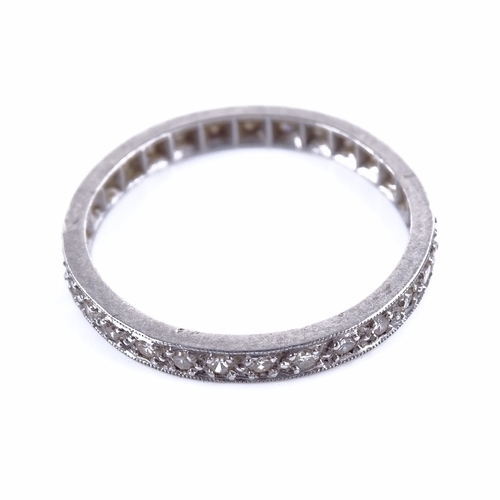 1156 - An early 20th century unmarked white metal diamond eternity ring, total diamond content approx 0.3ct... 