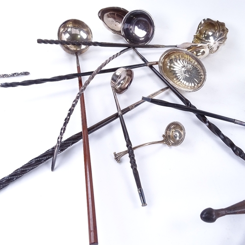 1624 - A large quantity of silver and silver plated toddy ladles and sifter spoon, including models with tw... 