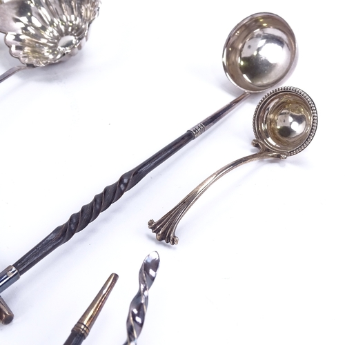 1624 - A large quantity of silver and silver plated toddy ladles and sifter spoon, including models with tw... 