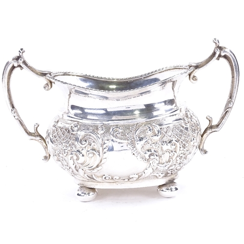 1626 - A late Victorian silver 2-handled sugar bowl, relief embossed foliate and lattice decoration, on bun... 