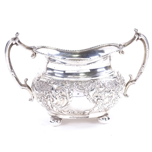 1626 - A late Victorian silver 2-handled sugar bowl, relief embossed foliate and lattice decoration, on bun... 