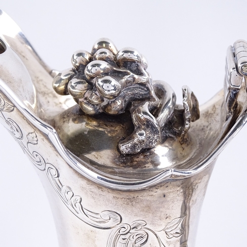 1631 - A William IV silver baluster Claret/hot water jug, lobed form with allover foliate engraved decorati... 