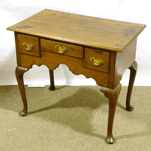 204 - An 18th century oak lowboy, with 3 frieze drawers, shaped apron and cabriole legs, 79cm x 47cm, heig... 