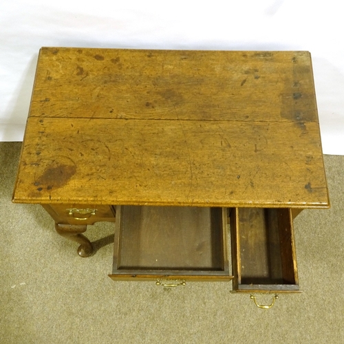 204 - An 18th century oak lowboy, with 3 frieze drawers, shaped apron and cabriole legs, 79cm x 47cm, heig... 