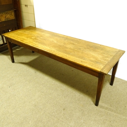 209 - A large 19th century beech farmhouse table with 2.5cm thick plank top, on tapered legs, 248cm x 83cm