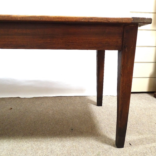 209 - A large 19th century beech farmhouse table with 2.5cm thick plank top, on tapered legs, 248cm x 83cm