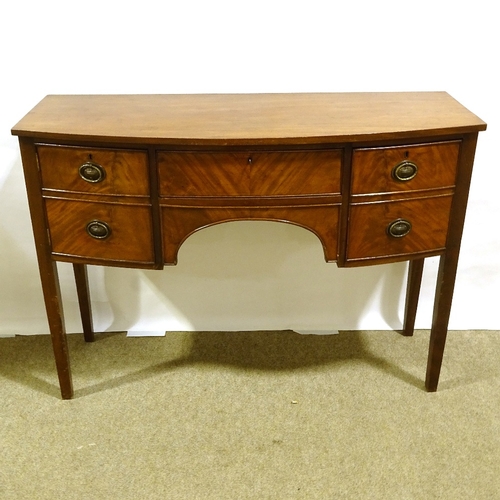 246 - A 19th century mahogany bow-front kneehole sideboard, width 125cm