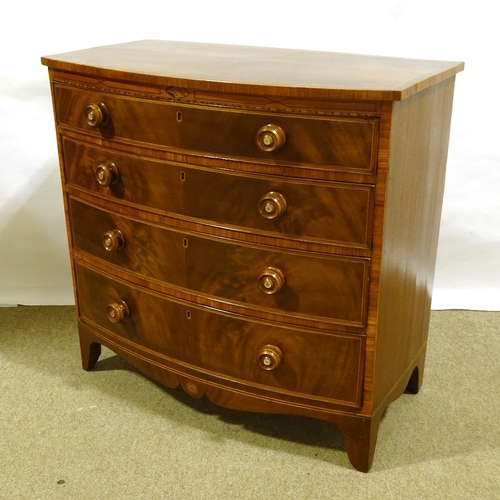 248 - A Regency mahogany and rosewood crossbanded bow-front chest of 4 long drawers, with mother-of-pearl ... 