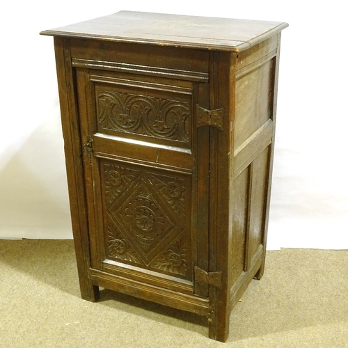 280 - 17th/18th century carved and panelled oak cupboard, height 106cm, width 68cm, depth 49cm