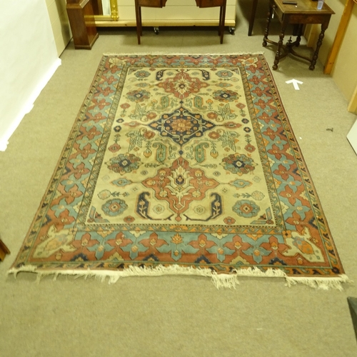 287 - A modern handmade geometric design Persian rug, 346cm x 220cm.