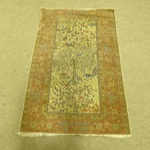 290 - An Isfahan handmade peacock design rug, 184cm x 110cm.