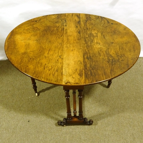 394 - A 19th century walnut oval Sutherland occasional table, width 92cm