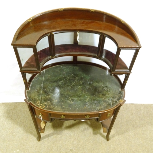 556 - An unusual Edwardian mahogany writing desk, with curved glass-panelled upper section, glass-panelled... 