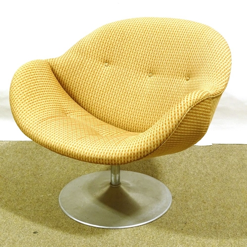 565 - Pierre Paulin, mid-century lounge chair with buttoned upholstery, on aluminium circular platform bas... 