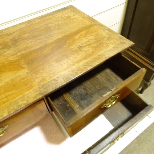 572 - An 18th century crossbanded walnut chest on stand, with brass drop handles, width 93cm, height 122cm