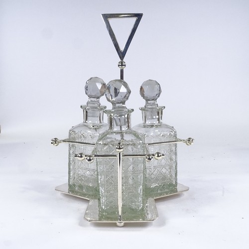 94 - A set of 3 square cut-glass decanters on Aesthetic style electroplate stand, probably mid-20th centu... 