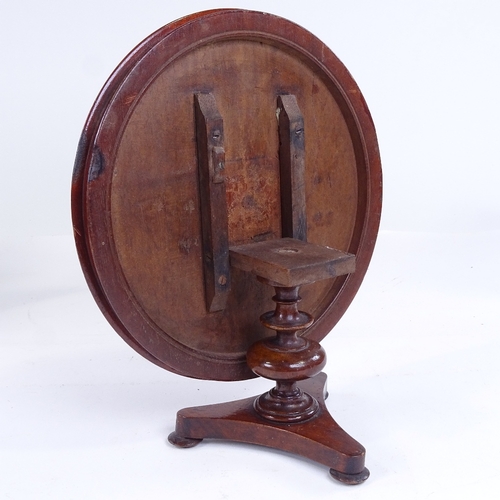 300 - A 19th century mahogany doll's tilt-top dining table, with bird marquetry inlaid top and platform ba... 