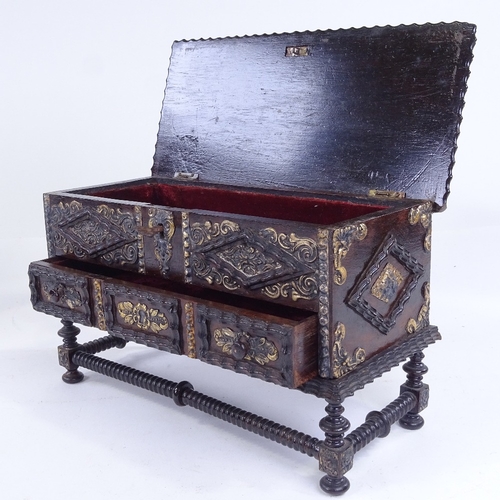 301 - A 19th century Portuguese mahogany jewel casket, with rising lid, relief moulded silver mounts, on b... 