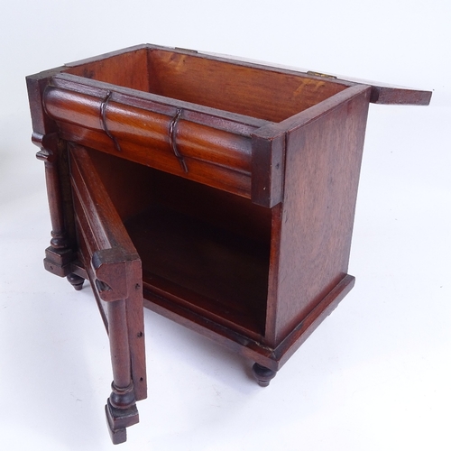 302 - A small Victorian mahogany table-top cabinet in the form of a chest of drawers, with rising lid and ... 