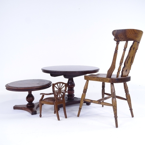 303 - A group of doll's furniture, including a 1930s panelled coffer, width 24cm, 2 tilt-top dining tables... 