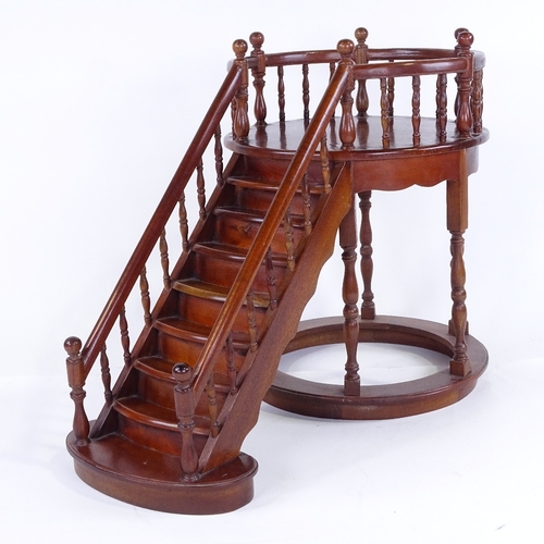 304 - 2 mahogany staircase design display stands, late 20th century, largest width 45cm