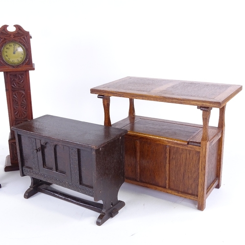 306 - A group of doll's furniture, including oak monk's settle, width 27cm, a miniature longcase clock, a ... 