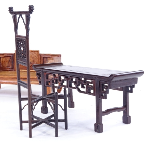 308 - 3 pieces of miniature Chinese hardwood furniture, including a panelled settle, width 24cm, altar tab... 