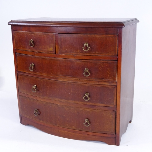 311 - An Edwardian mahogany apprentice bow-front chest of drawers, with brass drop handles, width 37cm, he... 