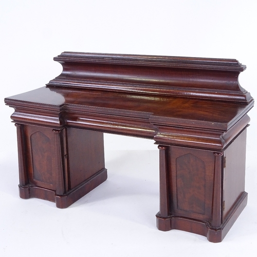 312 - A fine early Victorian flame mahogany apprentice pedestal sideboard, with 3 frieze drawers and panel... 