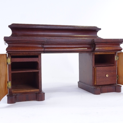 312 - A fine early Victorian flame mahogany apprentice pedestal sideboard, with 3 frieze drawers and panel... 